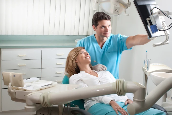 Dr. Mariano Estrada explaining smile makeover plan to patient, Mariano Estrada - Center for Implants & Dental Aesthetics, Santo Domingo, Dominican Republic